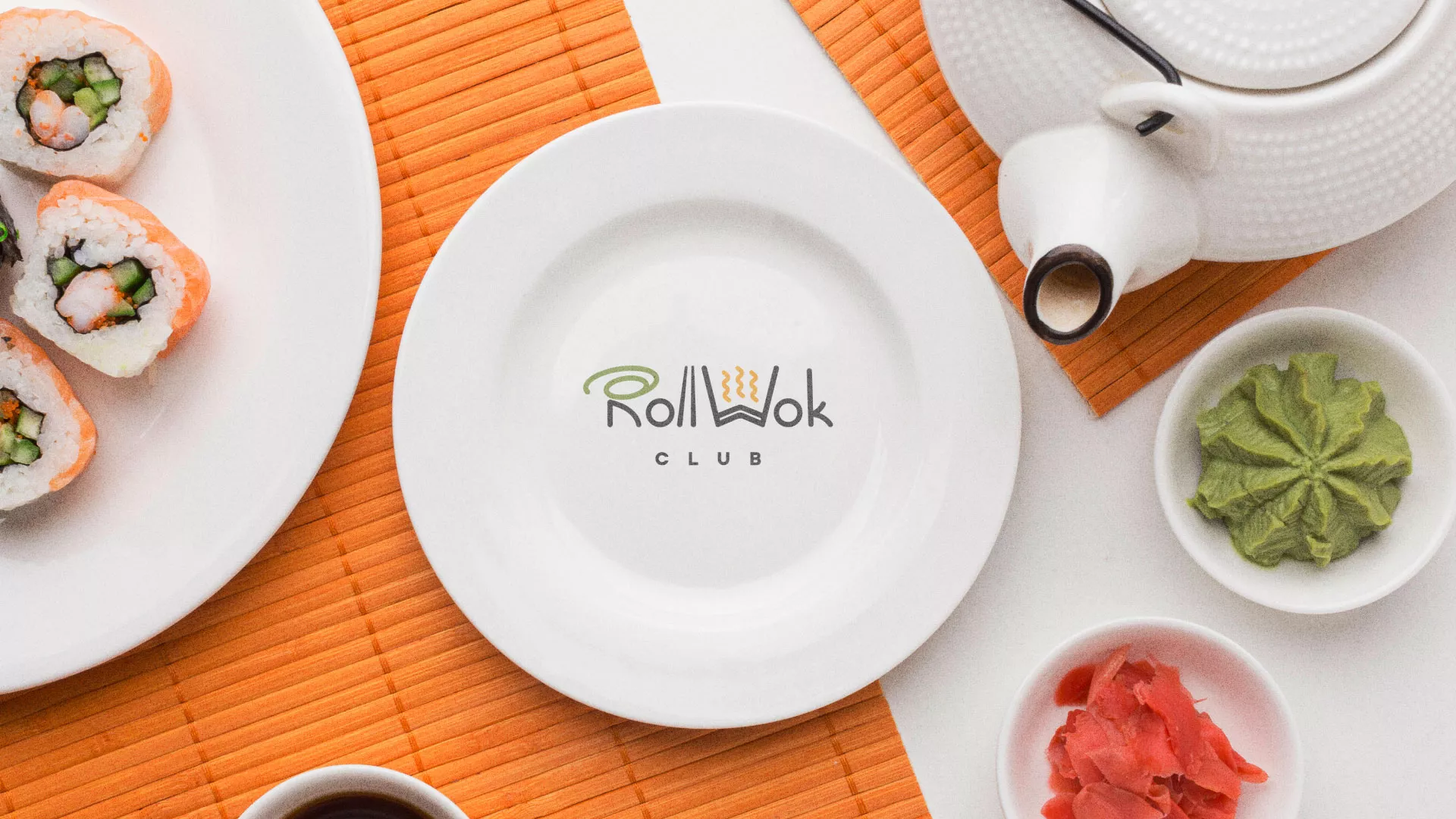 Разработка логотипа и фирменного стиля в Мезени для суши-бара «Roll Wok Club» Разработка логотипа и фирменного стиля в Мезени для суши-бара «Roll Wok Club»